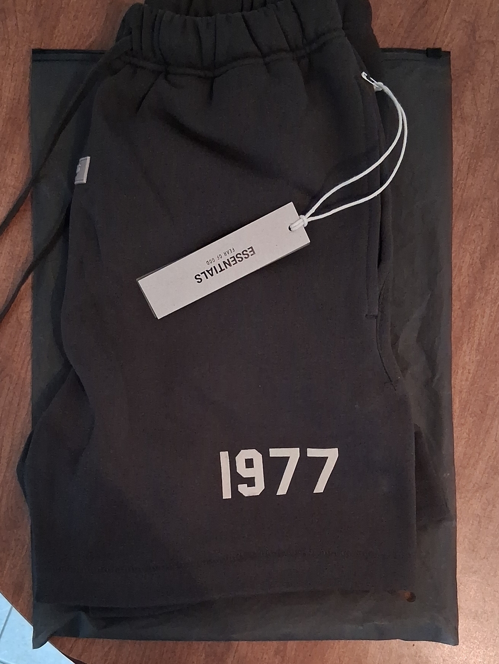 ESSENTIALS Men’s Off Black Sweatshorts with 1977 Graphic